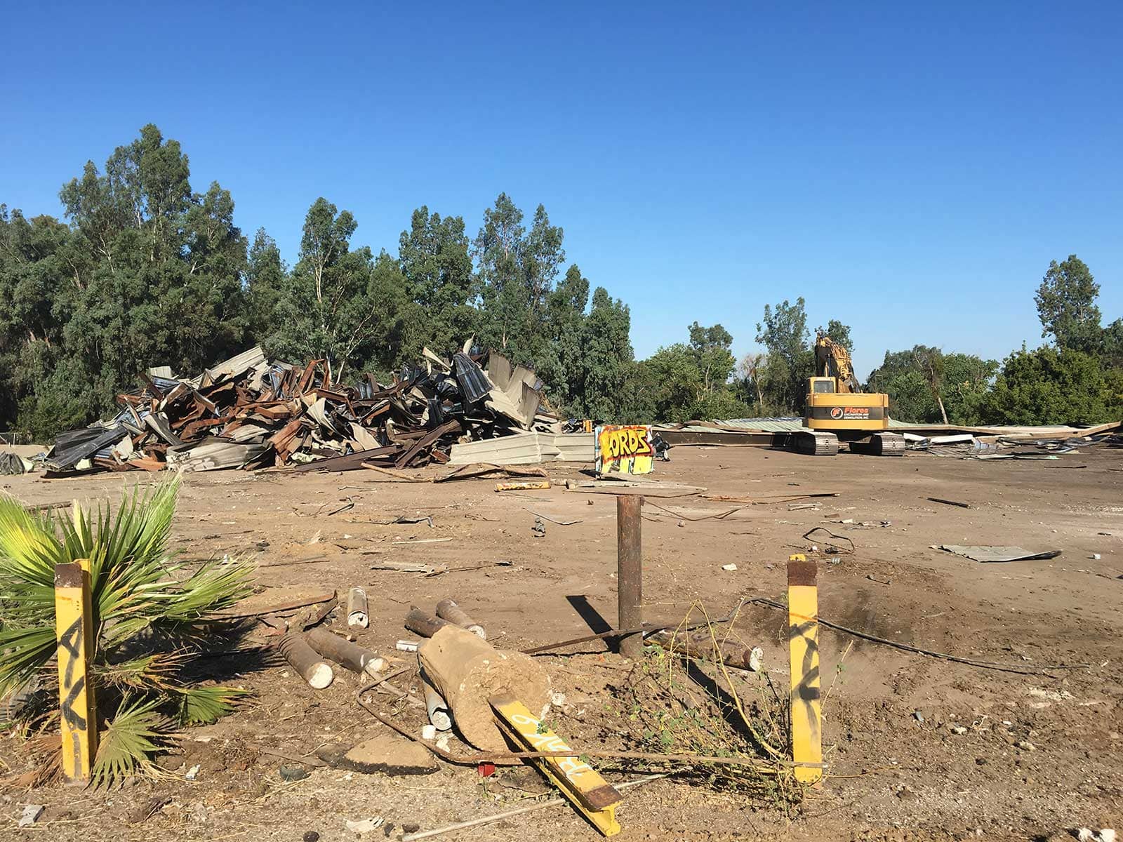 Heavy equipment working on a commercial demolition site